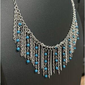 Dangle silver and blue necklace and earrings